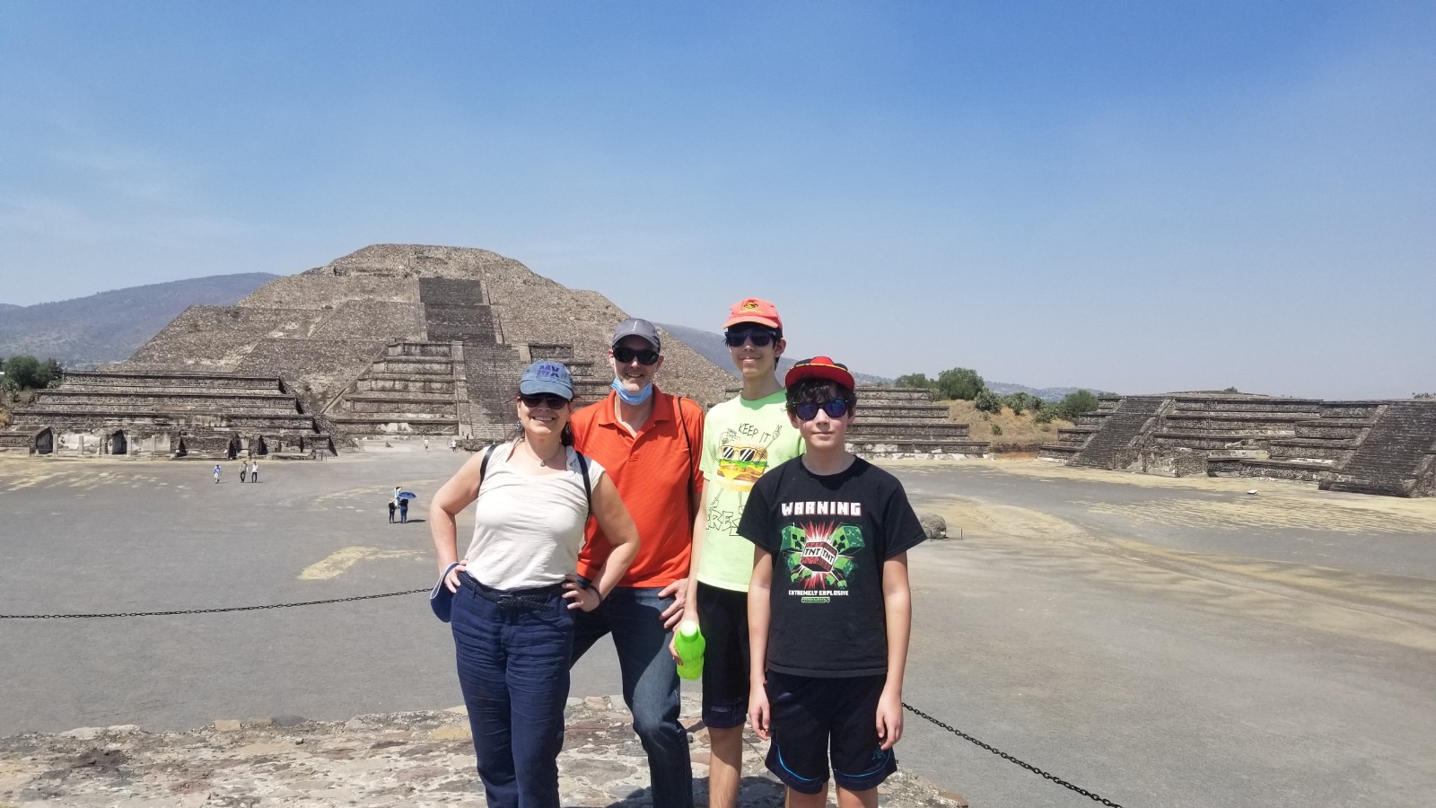 family photo in front of tetiohuacan ruins